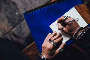 image for kbeau blog post about why jewelry turns your skin green black. The image is a man