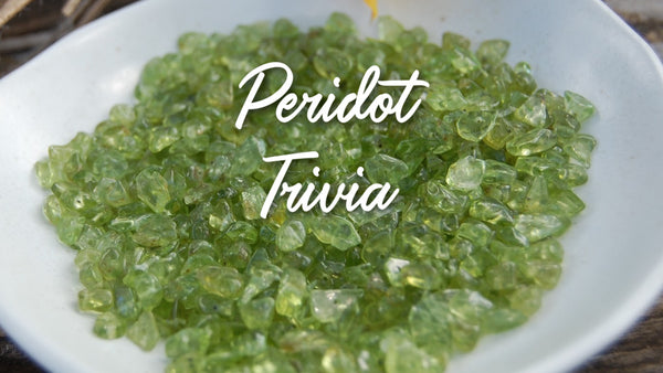 peridot august birthstone kbeau jewelry a small, shallow bowl full of chipped peridot beads