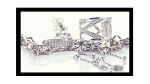 an assortment of jewelry that is rhodium plated that