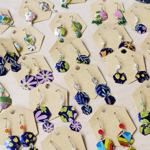 Colorful hexagonal earrings  made from tea tins some with beads or crystals 