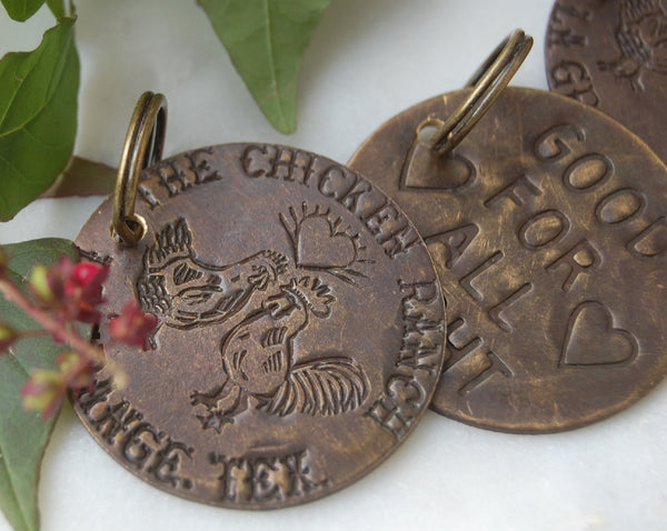 Replica of chicken ranch brothel tokens made into keychains by kbeau jewelry