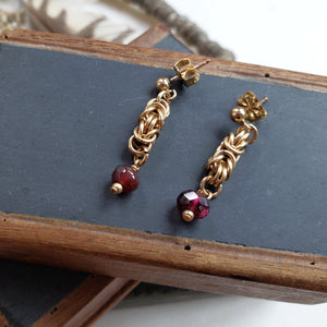 Gold earrings in byzantine pattern with amethyst drops