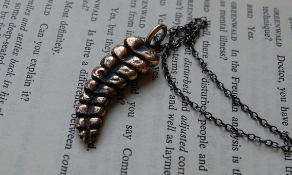 Bronze rattlesnake rattle on dark silver chain