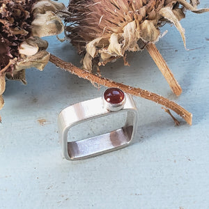 sterling silver square ring with offset carnelian cabochon